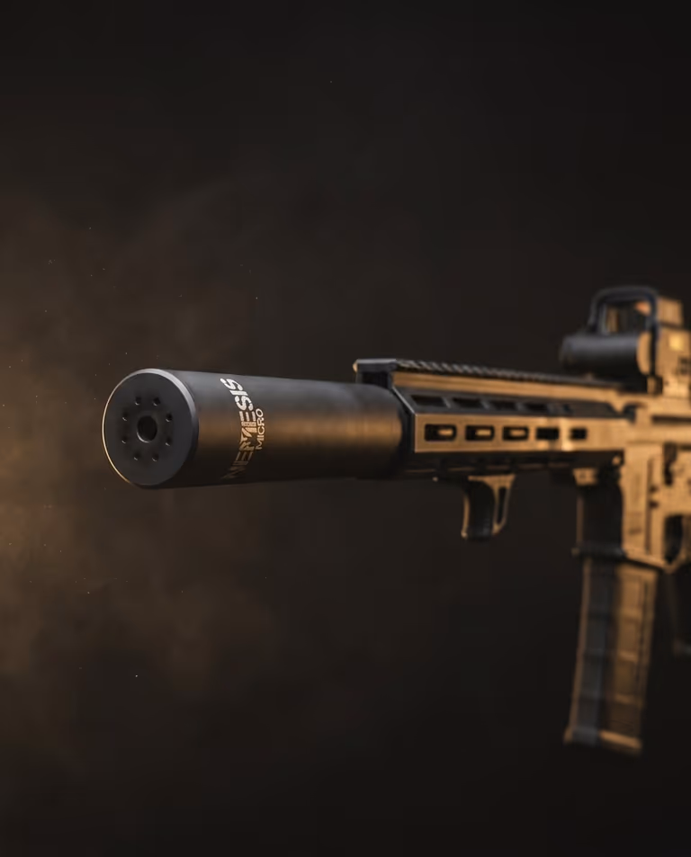 Саундмодератор NEMESIS MICRO 5.56 чорний матовий накручений на ствол AR-15, вид збоку